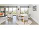 Cozy dining area featuring modern table with plush chairs and natural light at 330 Concord St # 4A, Charleston, SC 29401