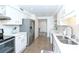 Clean kitchen with white cabinets, stainless steel appliances, and white tile backsplash at 330 Concord St # 4A, Charleston, SC 29401