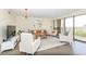 Inviting living room with a leather sofa, sleek decor and expansive views at 330 Concord St # 4A, Charleston, SC 29401