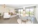 Open living space with combined living room and dining area, all with balcony access at 330 Concord St # 4A, Charleston, SC 29401