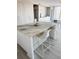 Kitchen island featuring a unique marble countertop and modern white bar stools at 330 Concord St # 5D & 5E, Charleston, SC 29401