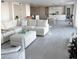 Spacious living room with a comfortable white sectional sofa and open floor plan at 330 Concord St # 5D & 5E, Charleston, SC 29401