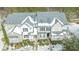 Winter aerial of a two-story home with a well-maintained yard covered in snow at 333 Flyway Rd, Goose Creek, SC 29445