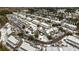 Winter aerial view of a community with houses and townhomes and snow covered roofs at 333 Flyway Rd, Goose Creek, SC 29445