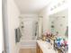 Well-lit bathroom featuring a tub and shower combination with built in shelving for storage at 333 Flyway Rd, Goose Creek, SC 29445