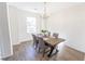 Clean dining room featuring modern table, stylish chairs and a chandelier at 333 Flyway Rd, Goose Creek, SC 29445