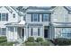 Inviting townhouse with blue siding, black shutters and minimal snow accents at 333 Flyway Rd, Goose Creek, SC 29445