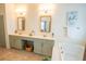 Large bathroom features double sinks, a soaking tub, and a decorative mirror at 3439 Toomer Kiln Cir, Mount Pleasant, SC 29466
