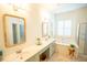 Dual vanity bathroom with mirrors, tub, and walk-in shower at 3439 Toomer Kiln Cir, Mount Pleasant, SC 29466