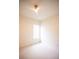 Bright, carpeted bedroom featuring a ceiling fan and natural light from a window at 3439 Toomer Kiln Cir, Mount Pleasant, SC 29466