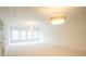 Bonus room with large windows and unique light fixtures at 3439 Toomer Kiln Cir, Mount Pleasant, SC 29466