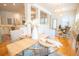 Open-concept dining room with stylish chandelier and views of the kitchen and living area at 3439 Toomer Kiln Cir, Mount Pleasant, SC 29466
