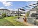 Landscaped backyard patio with furniture and a pergola at 3990 Hillyard St, North Charleston, SC 29405