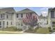 Inviting two-story home featuring a well-manicured lawn and a delightful porch at 3990 Hillyard St, North Charleston, SC 29405