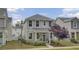 Charming two-story home featuring a manicured lawn and inviting front porch at 3990 Hillyard St, North Charleston, SC 29405
