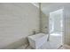 Bright bathroom features a modern tub with gold fixtures and decorative tile flooring at 404 Fairington Dr, Summerville, SC 29485
