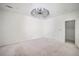 Bright bedroom boasts modern light fixture and ample natural light at 404 Fairington Dr, Summerville, SC 29485