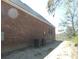 Exterior of a brick home, showcases the building's classic design and functionality at 404 Fairington Dr, Summerville, SC 29485