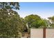 Backyard featuring a view of lush trees, foliage, and neighboring rooftops at 407 Pitt St, Mount Pleasant, SC 29464