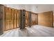 Unfinished basement featuring exposed framing, concrete floor and block foundation walls at 407 Pitt St, Mount Pleasant, SC 29464