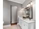 Elegant bathroom featuring double vanity, granite countertops, and stylish fixtures at 407 Pitt St, Mount Pleasant, SC 29464