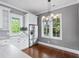 Bright eat-in kitchen featuring stainless steel appliances, white cabinets and windows with natural light at 407 Pitt St, Mount Pleasant, SC 29464