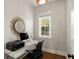 Bright home office with modern desk setup, window view, and stylish decor creating an efficient workspace at 407 Pitt St, Mount Pleasant, SC 29464