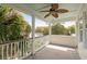 Spacious porch with ceiling fan, decorative railing and views at 407 Pitt St, Mount Pleasant, SC 29464