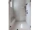 Modern shower featuring gray tiling, a rain shower head, and a built-in bench at 407 Pitt St, Mount Pleasant, SC 29464