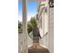 Exterior staircase leading to a balcony overlooks the private pool and backyard at 407 Pitt St, Mount Pleasant, SC 29464
