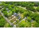 Aerial view of residential properties with lush landscaping near the golf course at 481 Woodland Shores Rd, Charleston, SC 29412