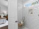Contemporary bathroom featuring subway tile shower and decorative accent tiles at 481 Woodland Shores Rd, Charleston, SC 29412
