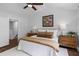 Beautifully appointed bedroom features a ceiling fan and an ensuite bathroom at 481 Woodland Shores Rd, Charleston, SC 29412