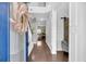 Welcoming foyer with hardwood floors, a barn door accent, and an inviting aesthetic at 482 Sanders Farm Ln, Wando, SC 29492
