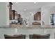 Open kitchen with granite counters, stainless steel appliances, and a breakfast bar at 482 Sanders Farm Ln, Wando, SC 29492