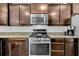 Gourmet kitchen with stainless steel appliances, granite countertops, and a subway tile backsplash at 482 Sanders Farm Ln, Wando, SC 29492