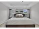 Comfortable main bedroom with tray ceilings, carpeted floors, and soft lighting creates a relaxing retreat at 482 Sanders Farm Ln, Wando, SC 29492