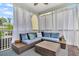 Relaxing porch area with outdoor seating and a scenic view at 482 Sanders Farm Ln, Wando, SC 29492