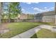 Lush backyard with a concrete patio area at 4856 Cane Pole Ln, Summerville, SC 29485