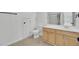 Bathroom features a vanity, toilet, and shower with a stylish shower curtain at 4856 Cane Pole Ln, Summerville, SC 29485