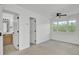Inviting bedroom featuring a ceiling fan, window, and access to an ensuite bathroom at 4856 Cane Pole Ln, Summerville, SC 29485