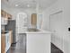 Bright kitchen with stainless steel appliances, light wood cabinets, and a breakfast bar with a view to the living area at 4856 Cane Pole Ln, Summerville, SC 29485