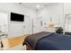 A comfortable bedroom featuring a bed and an open bathroom at 5 Addison St, Charleston, SC 29403