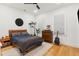 Cozy bedroom featuring a wood frame bed, modern furnishings, and a serene ambiance at 5 Addison St, Charleston, SC 29403