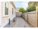 Long gravel driveway leads to a fenced backyard at 5 Addison St, Charleston, SC 29403