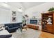Bright living room featuring modern decor, stylish sofas, large windows, and contemporary accents at 5 Addison St, Charleston, SC 29403