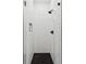 Modern shower with black accents, white subway tile, black hardware, and glass door at 5 Addison St, Charleston, SC 29403
