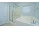 Bathroom featuring a shower, a soaking tub, and tile floors at 5008 Bowles Dr, Summerville, SC 29485