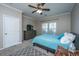 Comfortable bedroom with a ceiling fan, neutral walls, a dresser, and carpeted floors at 5008 Bowles Dr, Summerville, SC 29485