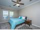 Cozy bedroom featuring a ceiling fan, neutral walls, and carpeted floors at 5008 Bowles Dr, Summerville, SC 29485